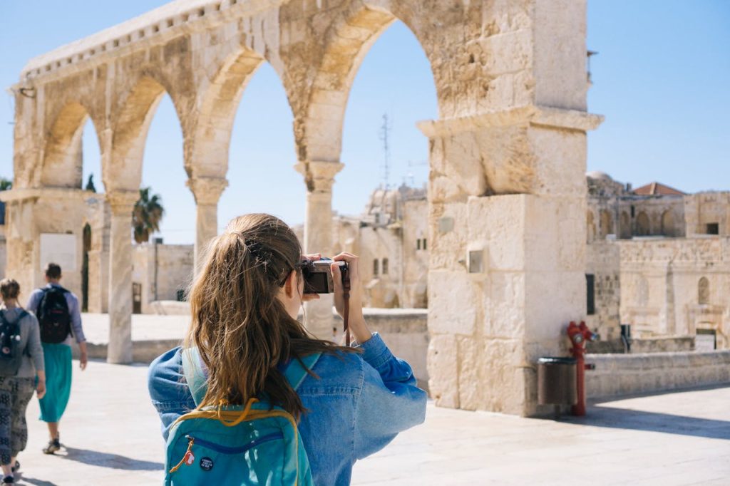 woman-taking-pictures-of-ruins-2087391 Woman Taking Pictures of Ruins